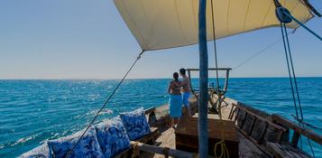 A couple on a dhow boat ride in Mozambique