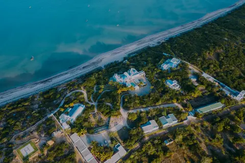 An aerial view of the Santorini Mozambique Villas and ocean
