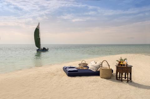A dhow picnic set up on the beach in Mozambique