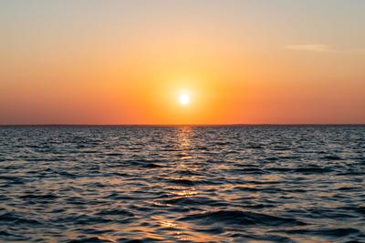 Sunset views over the ocean water